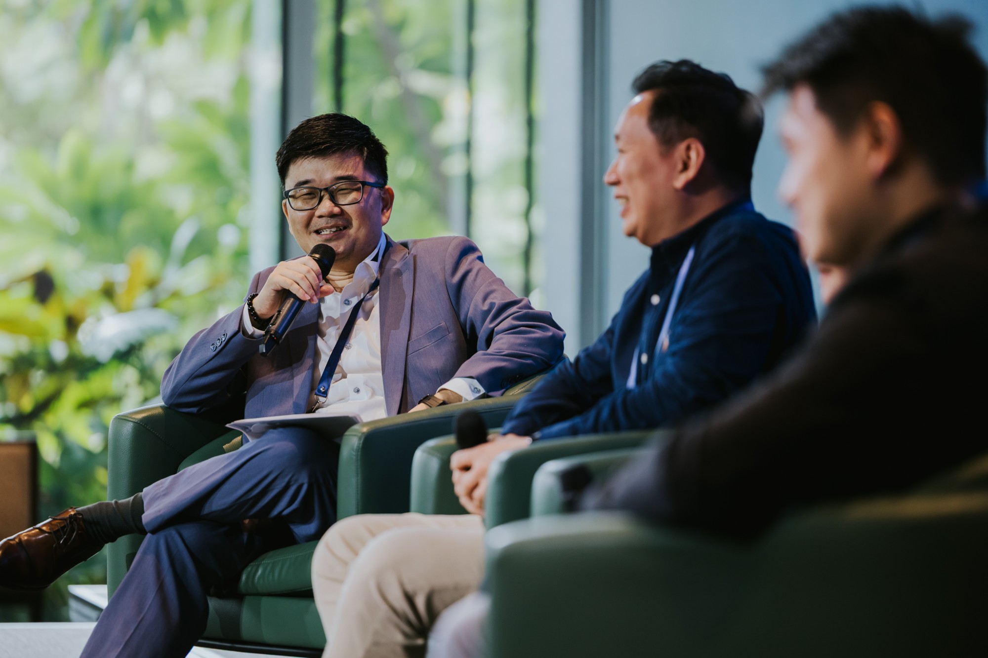 Phang Kang Yu moderating the workforce transformation panel at the Payoneer × CSPN Summit 2026